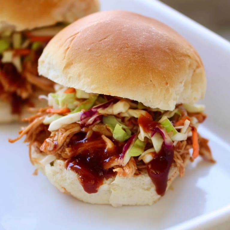 Garnish with fresh parsley and extra sauce for a delicious game day snack.